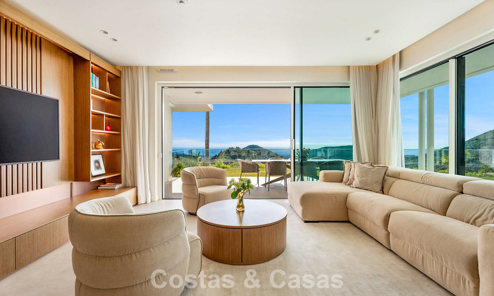 Modern, luxurious garden apartment for sale with panoramic coastal views in a gated boutique complex near Marbella town 794489