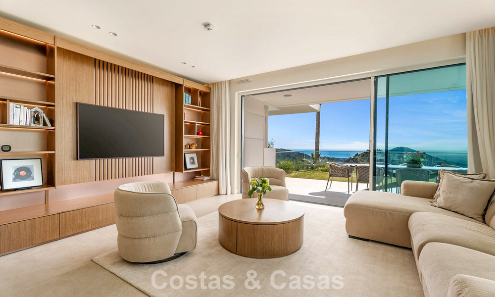 Modern, luxurious garden apartment for sale with panoramic coastal views in a gated boutique complex near Marbella town 794491