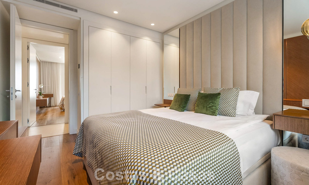 Modern, luxurious garden apartment for sale with panoramic coastal views in a gated boutique complex near Marbella town 794495