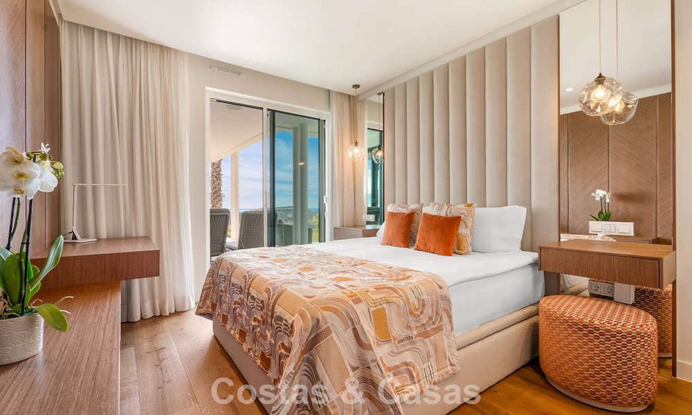 Modern, luxurious garden apartment for sale with panoramic coastal views in a gated boutique complex near Marbella town 794496