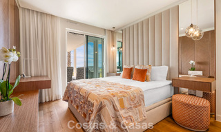 Modern, luxurious garden apartment for sale with panoramic coastal views in a gated boutique complex near Marbella town 794496 