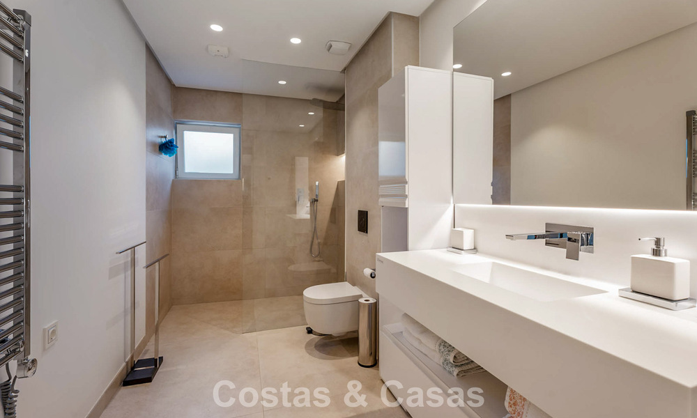 Modern, luxurious garden apartment for sale with panoramic coastal views in a gated boutique complex near Marbella town 794500