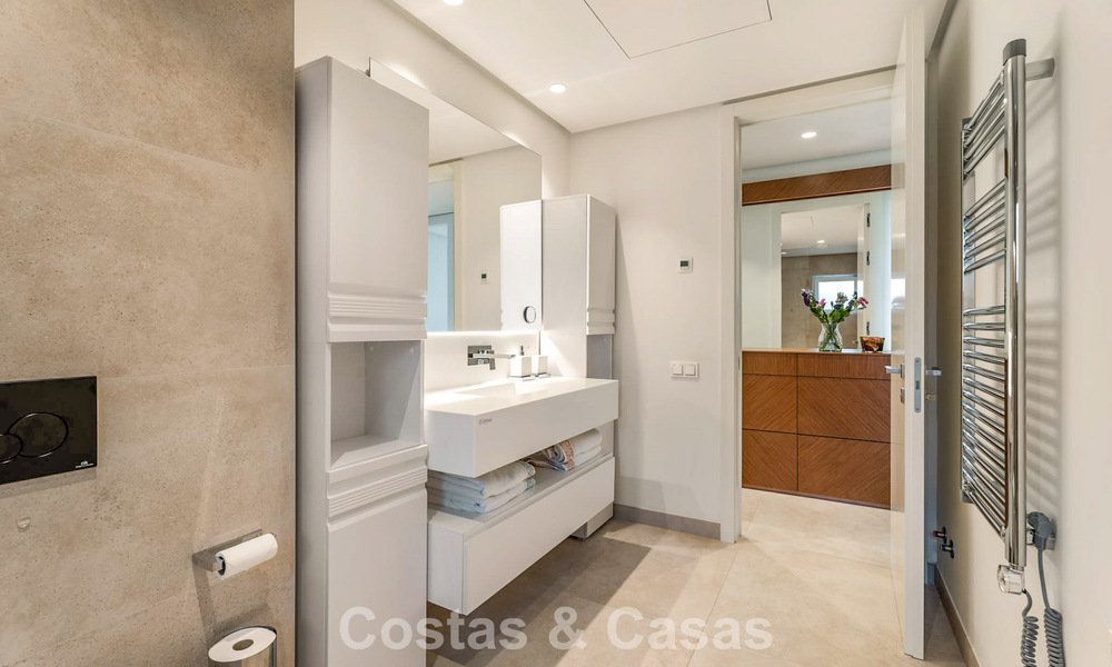 Modern, luxurious garden apartment for sale with panoramic coastal views in a gated boutique complex near Marbella town 794501