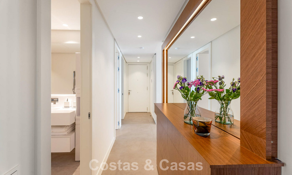 Modern, luxurious garden apartment for sale with panoramic coastal views in a gated boutique complex near Marbella town 794503