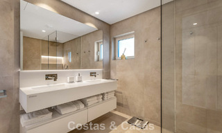 Modern, luxurious garden apartment for sale with panoramic coastal views in a gated boutique complex near Marbella town 794504 