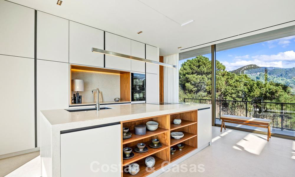 Boomerang-designed villa for sale in the green hills of Marbella - Benahavís with views over the hills and the sea 795241