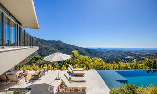 Boomerang-designed villa for sale in the green hills of Marbella - Benahavís with views over the hills and the sea 795243 