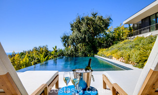 Boomerang-designed villa for sale in the green hills of Marbella - Benahavís with views over the hills and the sea 795247 