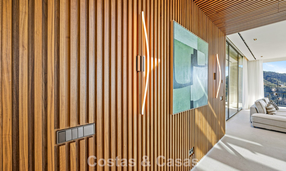 Boomerang-designed villa for sale in the green hills of Marbella - Benahavís with views over the hills and the sea 795253