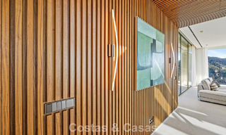 Boomerang-designed villa for sale in the green hills of Marbella - Benahavís with views over the hills and the sea 795253 