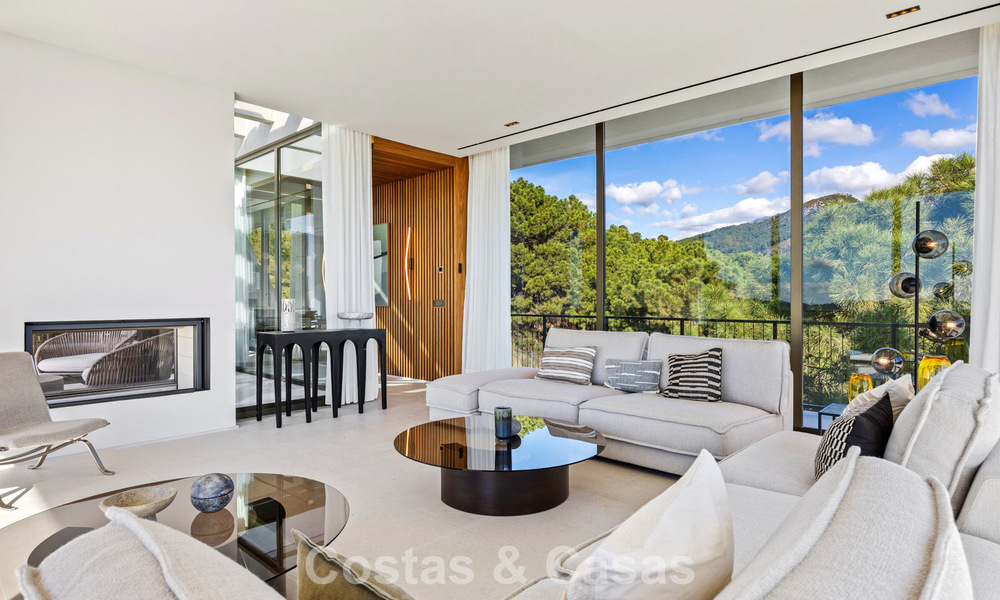 Boomerang-designed villa for sale in the green hills of Marbella - Benahavís with views over the hills and the sea 795256