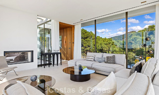 Boomerang-designed villa for sale in the green hills of Marbella - Benahavís with views over the hills and the sea 795256 