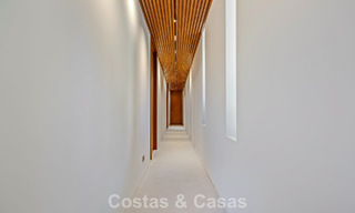 Boomerang-designed villa for sale in the green hills of Marbella - Benahavís with views over the hills and the sea 795258 