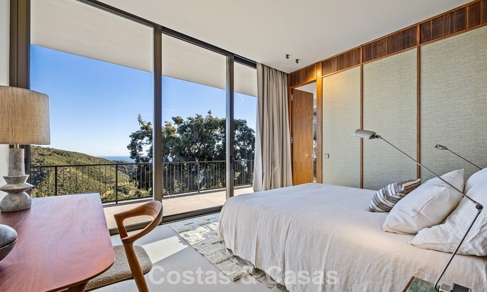 Boomerang-designed villa for sale in the green hills of Marbella - Benahavís with views over the hills and the sea 795259