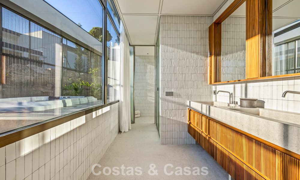 Boomerang-designed villa for sale in the green hills of Marbella - Benahavís with views over the hills and the sea 795260