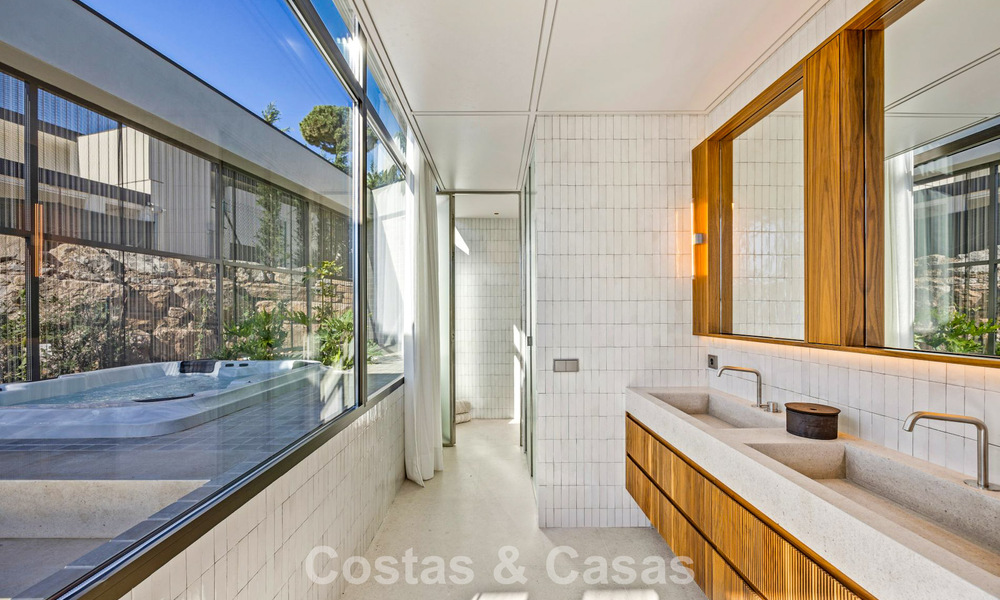 Boomerang-designed villa for sale in the green hills of Marbella - Benahavís with views over the hills and the sea 795261