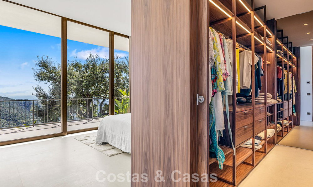 Boomerang-designed villa for sale in the green hills of Marbella - Benahavís with views over the hills and the sea 795264
