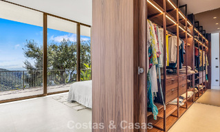 Boomerang-designed villa for sale in the green hills of Marbella - Benahavís with views over the hills and the sea 795264 