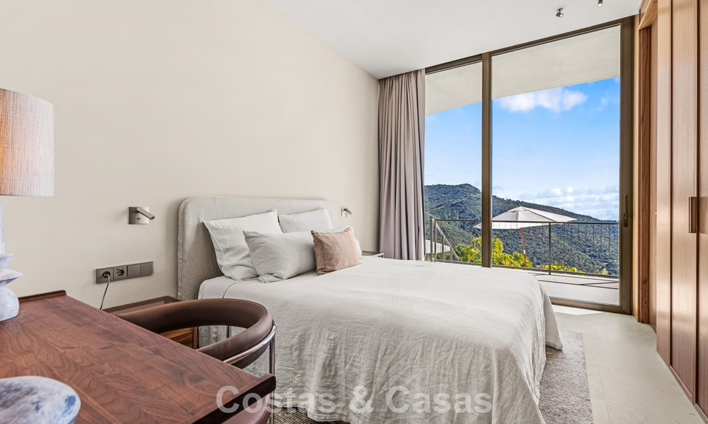 Boomerang-designed villa for sale in the green hills of Marbella - Benahavís with views over the hills and the sea 795265