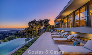 Boomerang-designed villa for sale in the green hills of Marbella - Benahavís with views over the hills and the sea 795266 