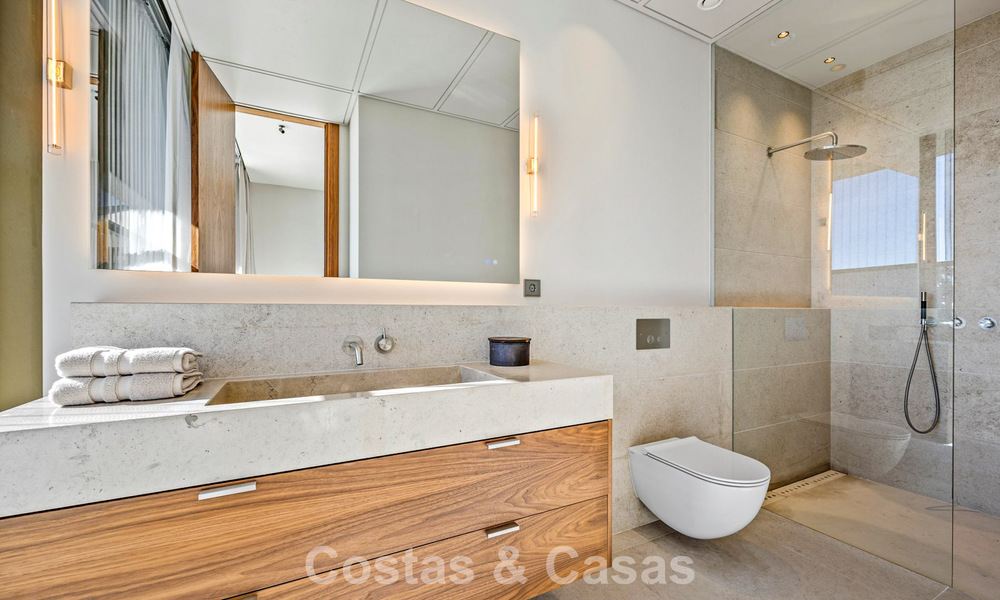 Boomerang-designed villa for sale in the green hills of Marbella - Benahavís with views over the hills and the sea 795267