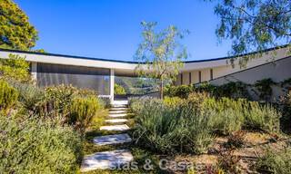 Boomerang-designed villa for sale in the green hills of Marbella - Benahavís with views over the hills and the sea 795268 