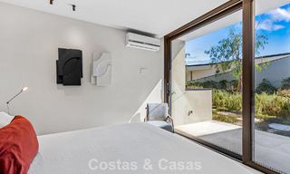 Boomerang-designed villa for sale in the green hills of Marbella - Benahavís with views over the hills and the sea 795272 