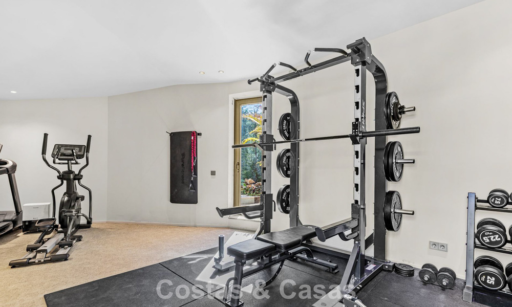 Boomerang-designed villa for sale in the green hills of Marbella - Benahavís with views over the hills and the sea 795275