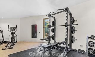 Boomerang-designed villa for sale in the green hills of Marbella - Benahavís with views over the hills and the sea 795275 