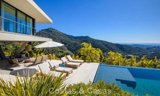 Boomerang-designed villa for sale in the green hills of Marbella - Benahavís with views over the hills and the sea 795276 