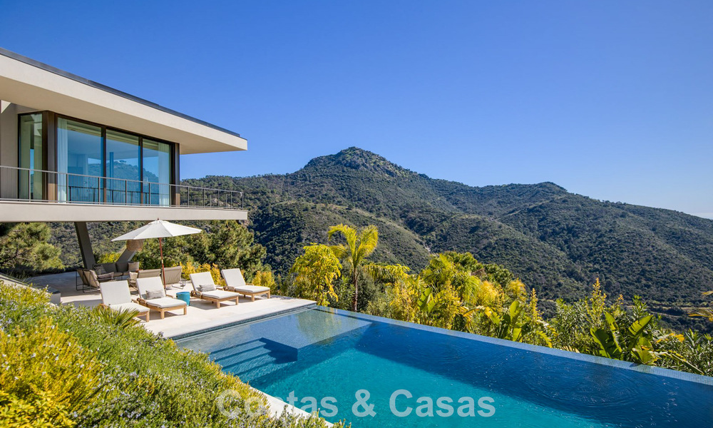 Boomerang-designed villa for sale in the green hills of Marbella - Benahavís with views over the hills and the sea 795277