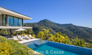Boomerang-designed villa for sale in the green hills of Marbella - Benahavís with views over the hills and the sea 795277 