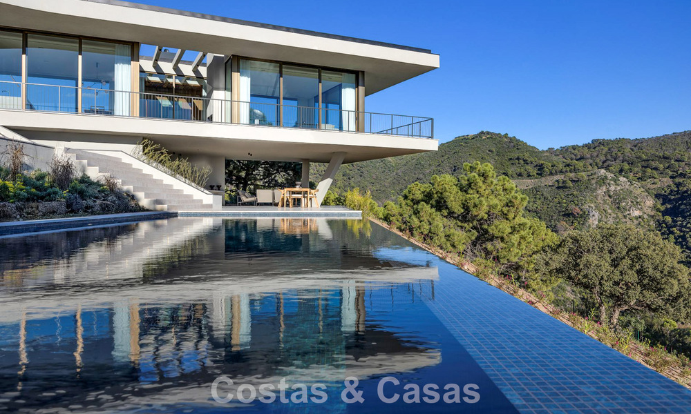 Boomerang-designed villa for sale in the green hills of Marbella - Benahavís with views over the hills and the sea 795278
