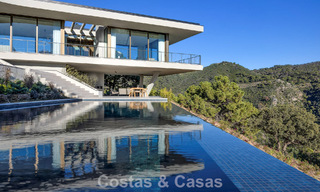 Boomerang-designed villa for sale in the green hills of Marbella - Benahavís with views over the hills and the sea 795278 