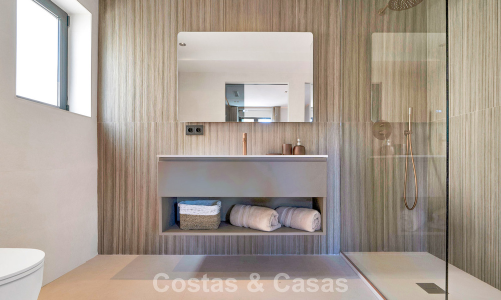 Stylishly modernised townhouse for sale within walking distance of the beach in Puerto Banús, Marbella 795318