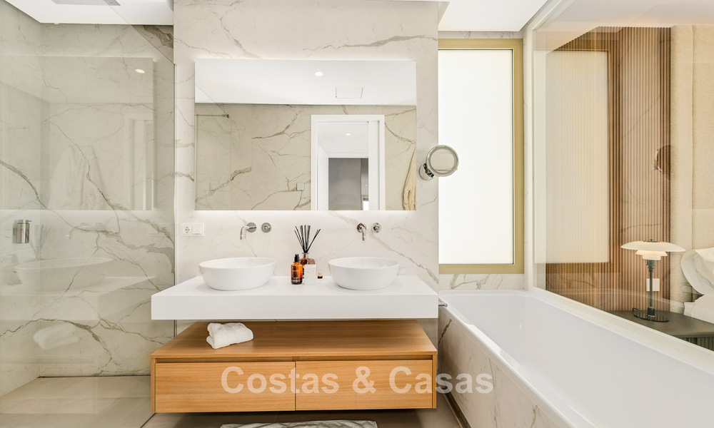 Sophisticated luxury apartment for sale with panoramic views on Marbella’s Golden Mile near the beach and Puerto Banús 796011