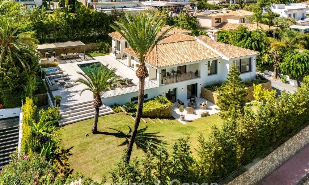 Elegant designer villa with panoramic views for sale over the golf valley of Nueva Andalucía, Marbella 795661