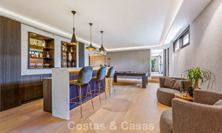 Elegant designer villa with panoramic views for sale over the golf valley of Nueva Andalucía, Marbella 795672 