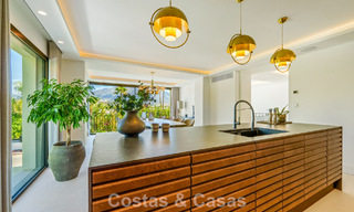 Elegant designer villa with panoramic views for sale over the golf valley of Nueva Andalucía, Marbella 795687 