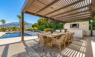Elegant designer villa with panoramic views for sale over the golf valley of Nueva Andalucía, Marbella 795698 