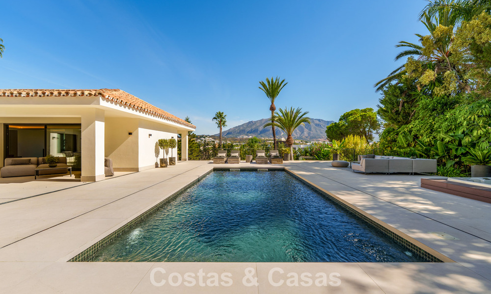 Elegant designer villa with panoramic views for sale over the golf valley of Nueva Andalucía, Marbella 795699