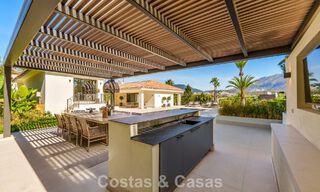 Elegant designer villa with panoramic views for sale over the golf valley of Nueva Andalucía, Marbella 795700 
