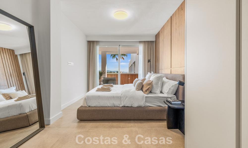 Modern renovated apartment with spacious terrace for sale with panoramic views in Nueva Andalucía, Marbella 796048
