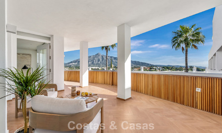 Modern renovated apartment with spacious terrace for sale with panoramic views in Nueva Andalucía, Marbella 796054