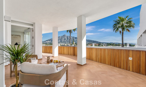 Modern renovated apartment with spacious terrace for sale with panoramic views in Nueva Andalucía, Marbella 796054