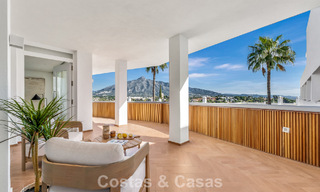 Modern renovated apartment with spacious terrace for sale with panoramic views in Nueva Andalucía, Marbella 796054 
