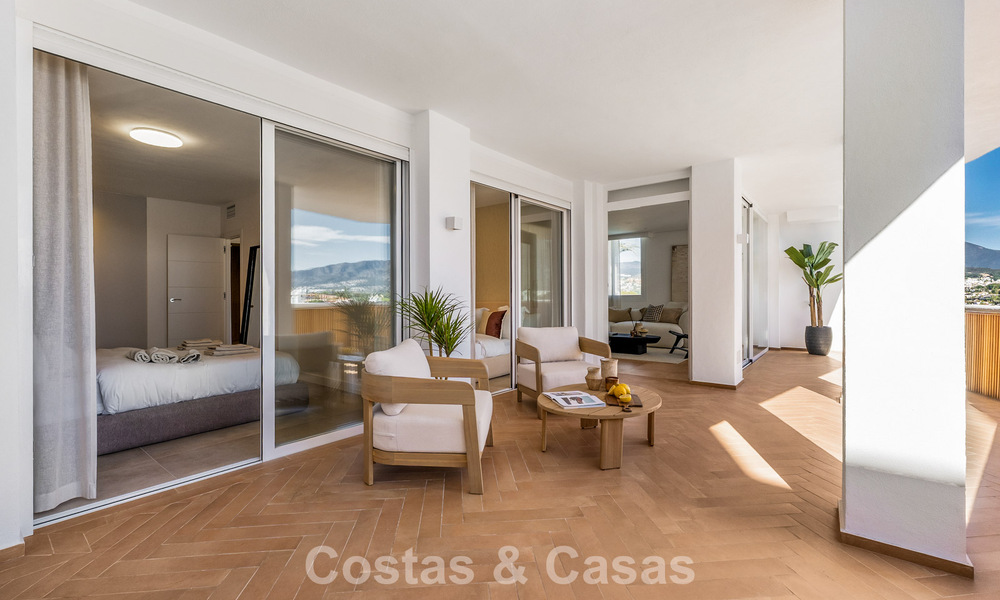 Modern renovated apartment with spacious terrace for sale with panoramic views in Nueva Andalucía, Marbella 796058
