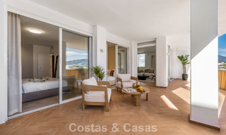 Modern renovated apartment with spacious terrace for sale with panoramic views in Nueva Andalucía, Marbella 796058 