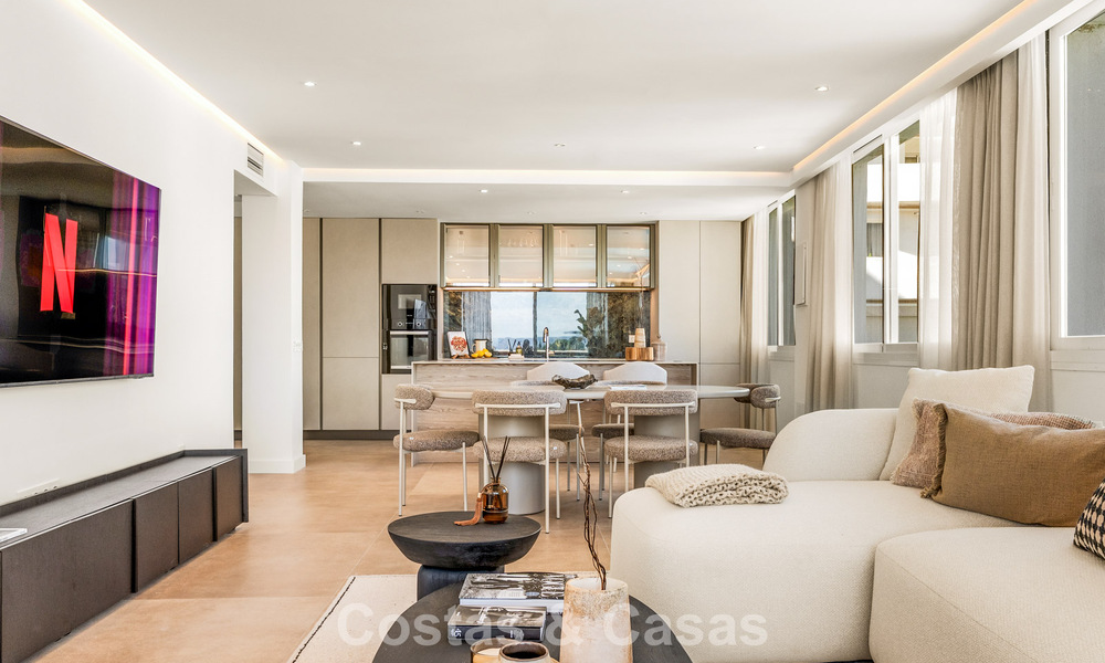 Modern renovated apartment with spacious terrace for sale with panoramic views in Nueva Andalucía, Marbella 796059