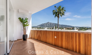 Modern renovated apartment with spacious terrace for sale with panoramic views in Nueva Andalucía, Marbella 796060 